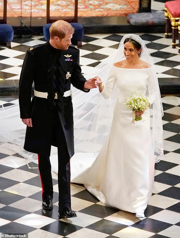 Harry and Meghan in St George's Chapel, Windsor, on their wedding day. Thomas also suffered suffered two heart attacks just before the ceremony, preventing him from walking his daughter down the aisle