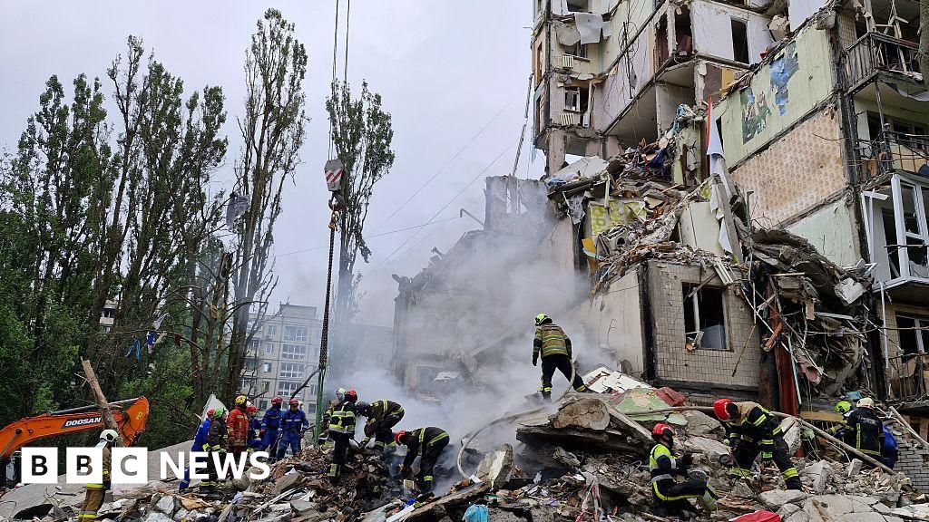 Russian strikes kill eight and hit apartment block in Kyiv, officials say