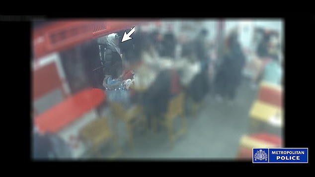 This is the moment Boulares stole a rucksack from a blind couple who were in Five Guys, Kensington, with their 10-year-old son on February 18