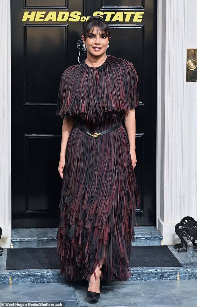 Priyanka later changed into a black and red tassled dress whch she cinched in at the waist with a black belt