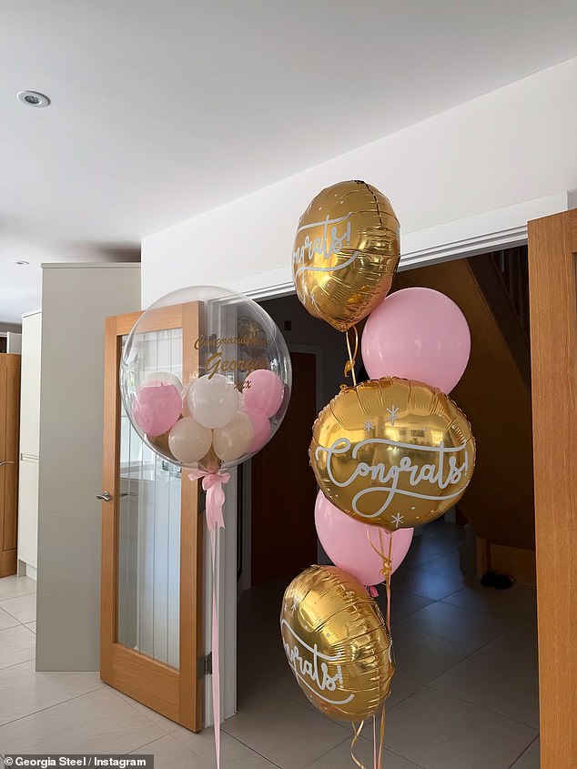 Her house was decorated with gold and pink balloons for the celebration