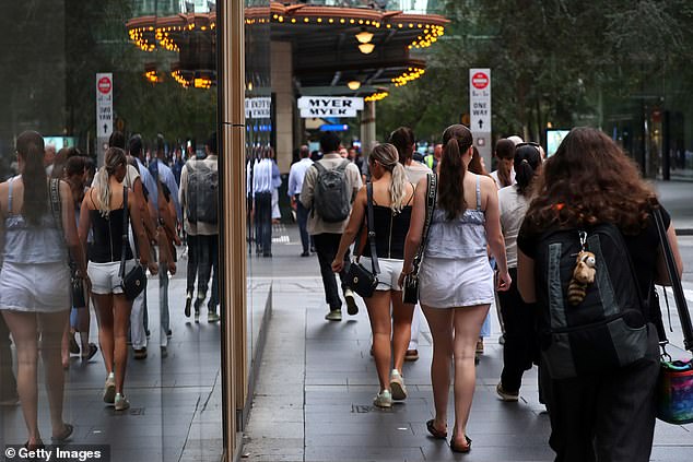 A major bank has slashed fixed mortgage rates ahead of an expected Reserve Bank rate cut next week (pictured, shoppers at Sydney's Pitt Street Mall)