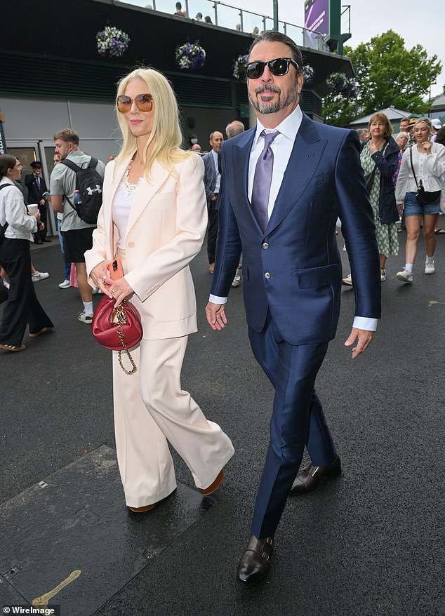 Dave Grohl led the stars attending day three of Wimbledon on Wednesday in his first public event with his wife Jordyn Blum since fathering a secret love child last year