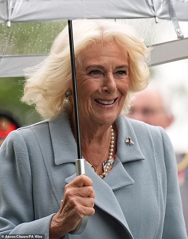 Camilla completed her ensemble by adding a string of pearls around her neck and matching pearl drop earrings