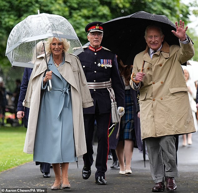 Pictured: King Charles and Queen Camilla arriving to unveil a Commemorative Cairn to mark the centenary of the Kirkcaldy War Memorial