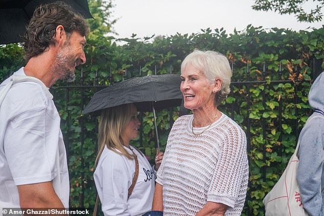 Judy Murray opted for a white crochet top as she was seen chatting with former Spanish tennis player Juan Carlos Ferrero