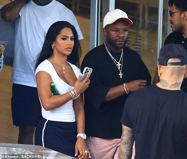 The pair were spotted leaving luxury outlet Neiman Marcus before hopping into a car together