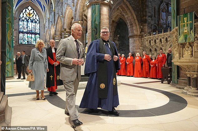 King Charles and Queen Camilla arrive to unveil a memorial stone in St Giles Cathedral