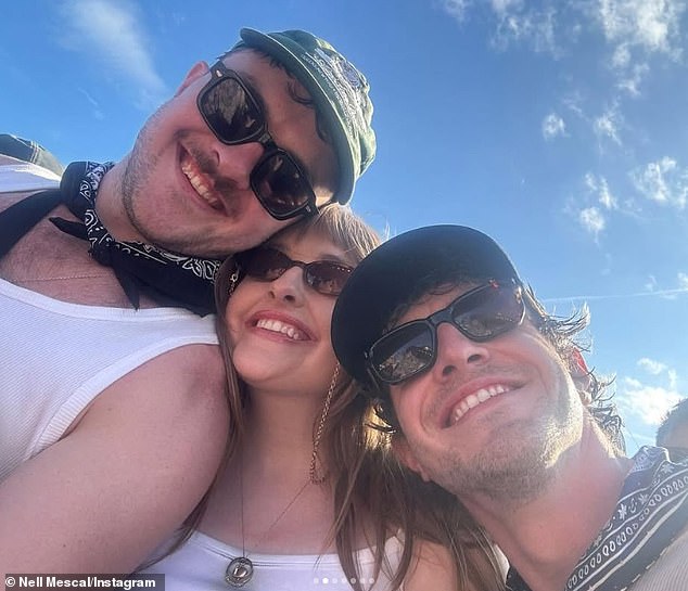Paul posed with his sister Nell and his lesser-seen brother Donnacha