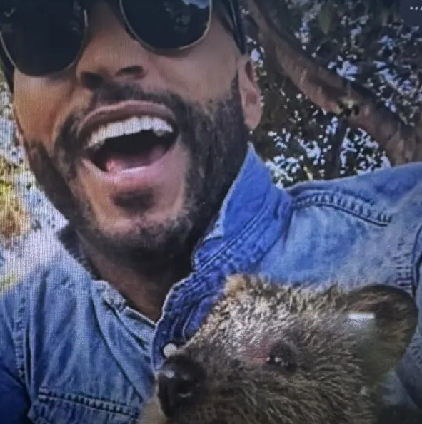 Phone screen showing Ricky Whittle's Raya profile.