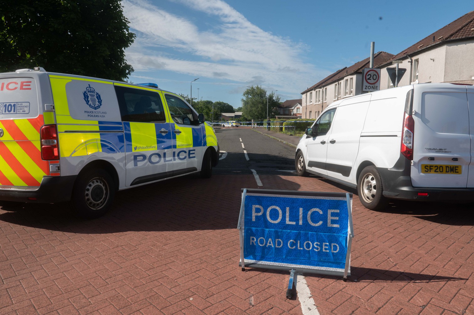 Man, 60, dies as police swoop on street in unexplained death probe in Glasgow