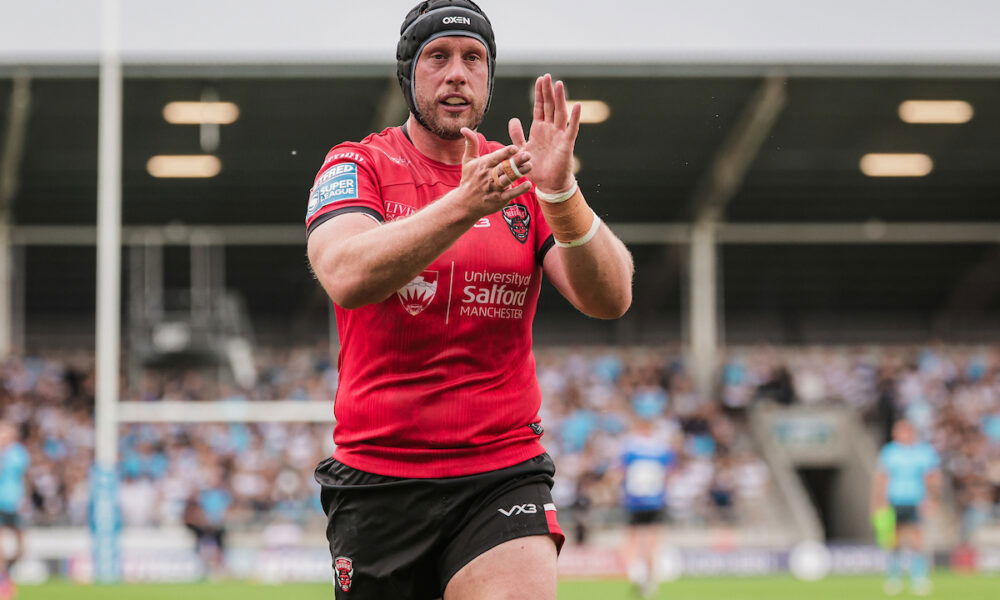 Salford Red Devils veteran Chris Hill applauds the fans