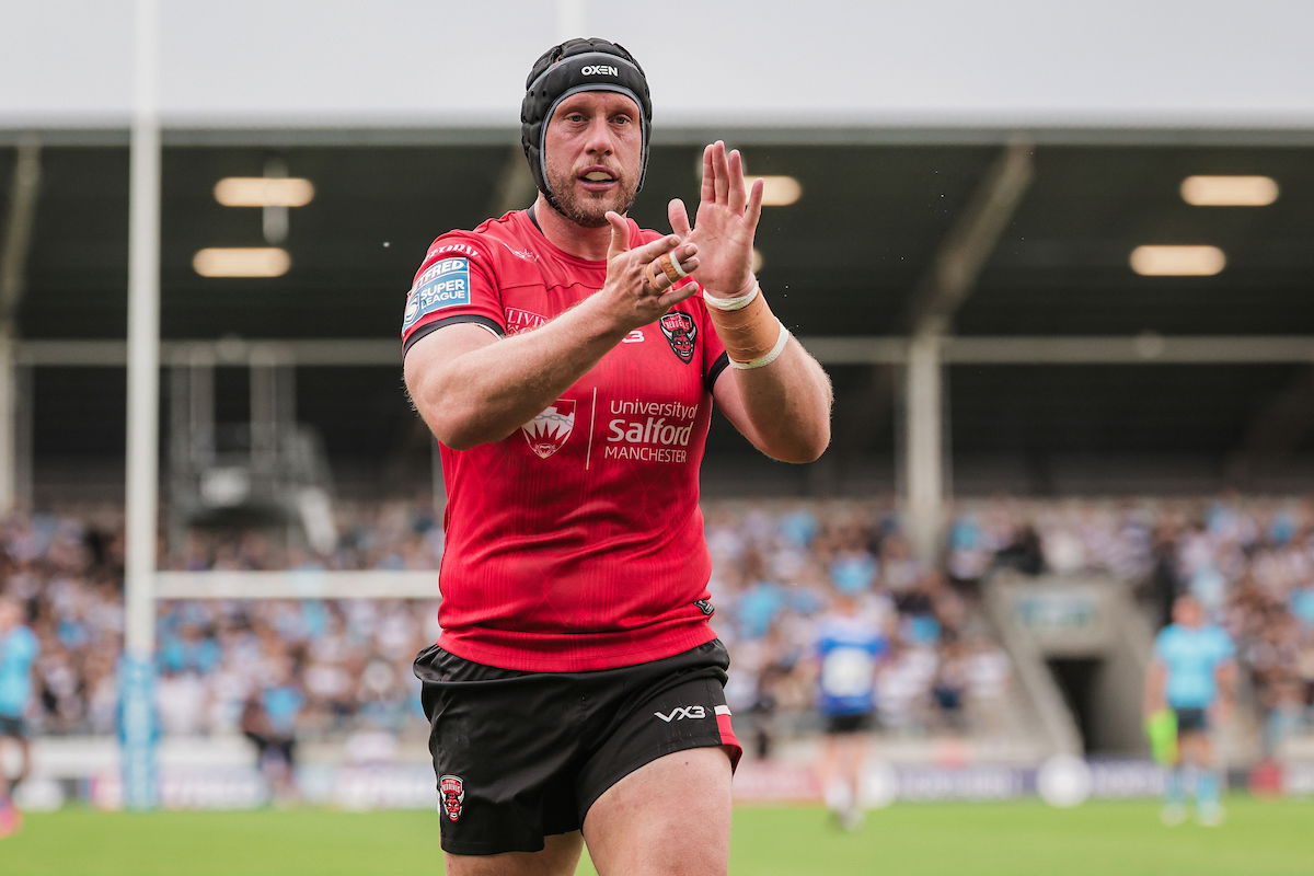 Salford Red Devils veteran Chris Hill applauds the fans