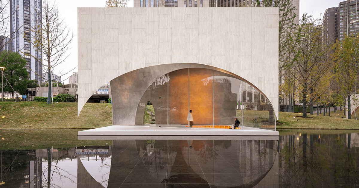 atelier xi unveils public art center as a landscape of four travertine pavilions in china