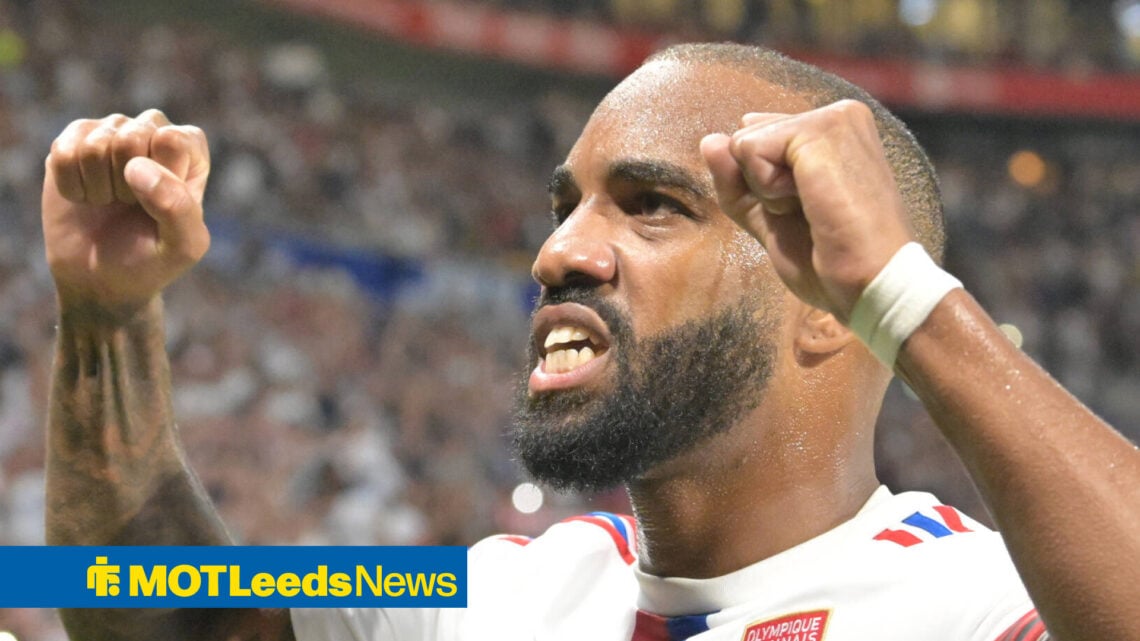 Alex Lacazette celebrates at Lyon