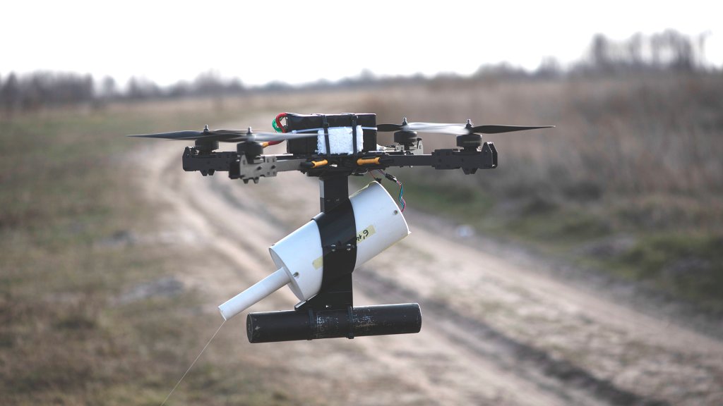 KYIV OBLAST, UKRAINE - DECEMBER 26: A drone controlled via a fiber-optic cable is seen during a test flight on December 26, 2024 in Kyiv Oblast, Ukraine. The Main Department of Defence Innovations of the Ministry of Defence of Ukraine, as part of the programs for the implementation of innovations and the development of the army of the future, conducted a presentation test of FPV drones controlled via a fiber optic cable for representatives of the commands of certain branches of the Armed Forces of Ukraine. During the event, Ukrainian manufacturers presented more than a dozen models of drones, some of which can carry up to 3 kg of payload. The demonstration flights were directly observed by experienced UAV operators, potential users of the latest technology on the battlefield during ongoing Russian-Ukrainian war. (Photo by Viktor Fridshon/Global Images Ukraine via Getty Images)