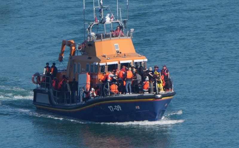 A group of people thought to be migrants are brought in to Dover, Kent