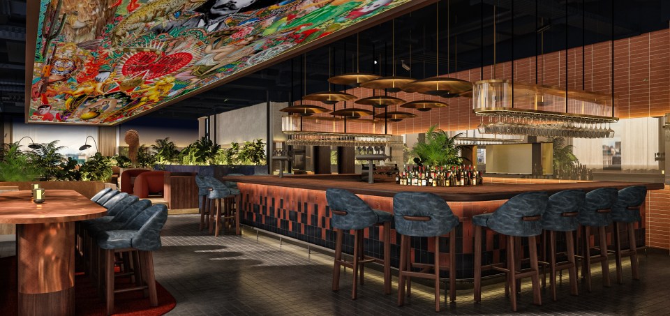 Bar with eclectic ceiling art and tropical plants.