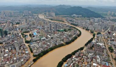 China on high alert for floods as record rain triggers landslides and building collapse
