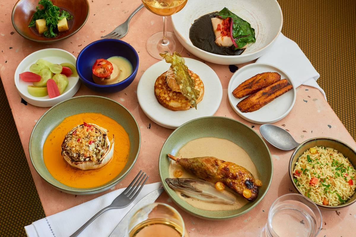 a table of delicious looking african dishes served at Chishuru