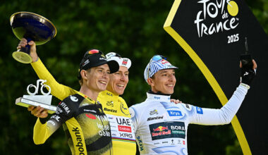 Overall winner UAE Team Emirates - XRG team's Slovenian rider Tadej Pogacar (C) wearing the overall leader's yellow jersey, second-placed Team Visma - Lease a bike team's Danish rider Jonas Vingegaard (L), and third-placed Red Bull - BORA - hansgrohe team's German rider Florian Lipowitz (R) celebrate on the podium after the 21st and final stage of the 112th edition of the Tour de France cycling race, 132.3 km between Mantes-la-Ville and Paris Champs-Ã‰lysees, on July 27, 2025. (Photo by Loic VENANCE / AFP)
