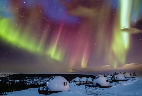Scenic view of snowcapped mountains against sky at night, Fairbanks, Alaska, United States, USA
