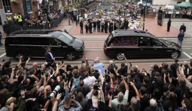 BIRMINGHAM, ENGLAND - JULY 30: Sharon Osbourne, Jack Osbourne, Kelly Osbourne and Aimee Osbourne view tributes to the late Ozzy Osbourne from fans at Black Sabbath Bench and Bridge as his funeral cortege travels through his home city of Birmingham on July 30, 2025 in Birmingham, England. The Black Sabbath frontman passed away on July 22nd at the age of 76. His death occurred just a little over two weeks after his final live performance at the 'Back to the Beginning' concert in his hometown of Birmingham. (Photo by Christopher Furlong/Getty Images)
