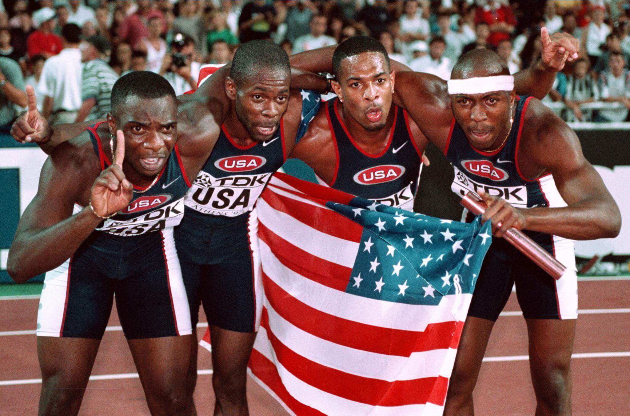 The U.S. 4x400m relay team of Jerome Young, Anthony Pettigrew, Chris Jones and Allen Johnson (l-r) after the Athens '97 World Athletics Championships final (ERIC FEFERBERG/AFP via Getty Images)