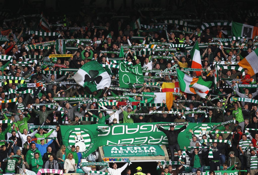 Celtic fans show their support for the players at Celtic Park before a league fixture against Motherwell