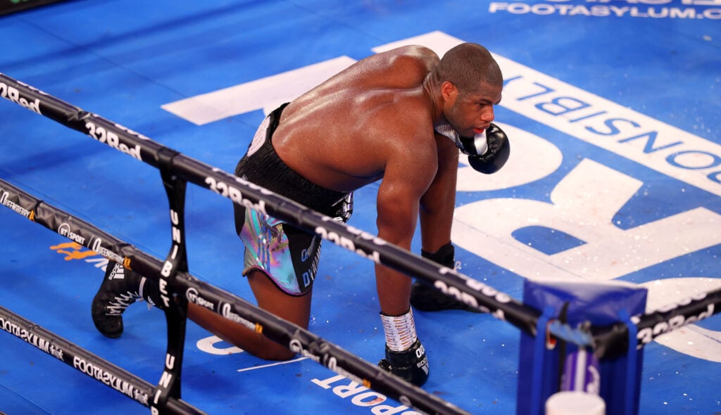 Daniel Dubois takes a knee after having his eye socket fractured by Joe Joyce