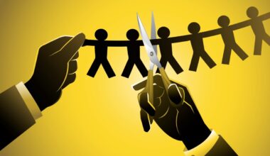 An illustration depicting a suited man cutting a paper chain of stick figures, meant to portray layoffs