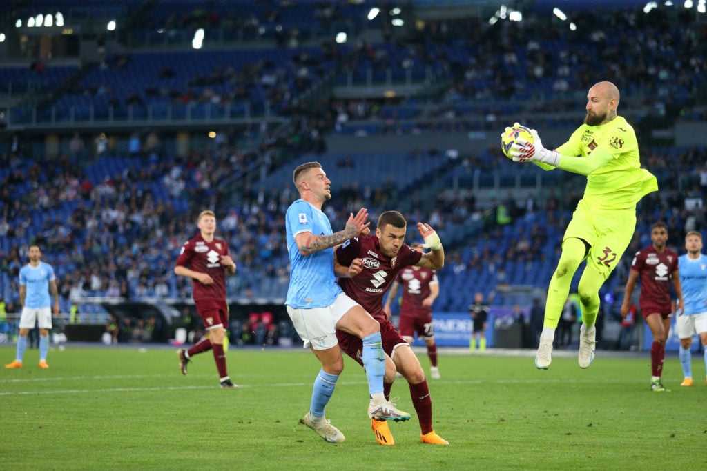 Vanja Milinkovic-Savic catches the ball for Torino ahead of his brother, Sergej Milinkovic-Savic.