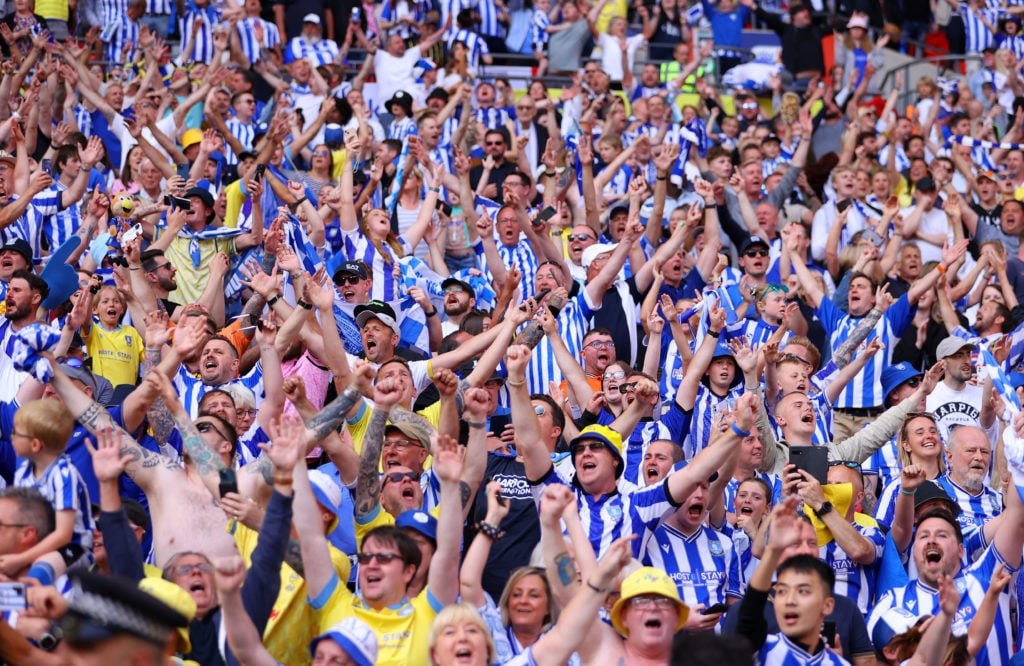 Sheffield Wednesday fans celebrate following the Sky Bet League One Play-Off Final between Barnsley and Sheffield Wednesday.