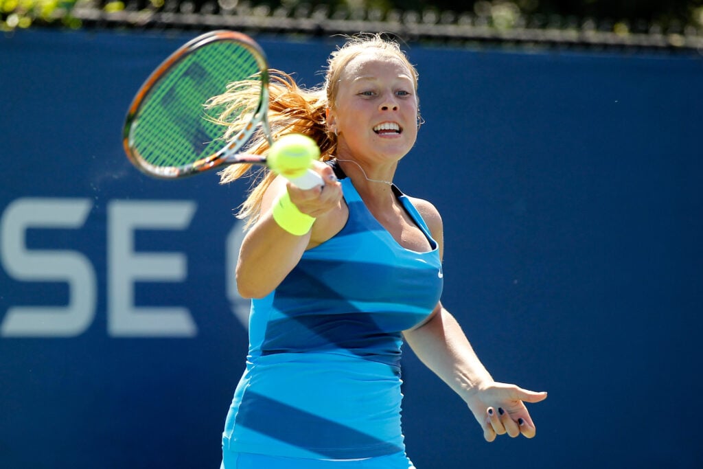 Anett Kontaveit of Estonia returns a shot during the junior girls' singles final against Samantha Crawford of the United States on Day Fourteen of the 2012 U.S. Open at the USTA Billie Jean King National Tennis Center.