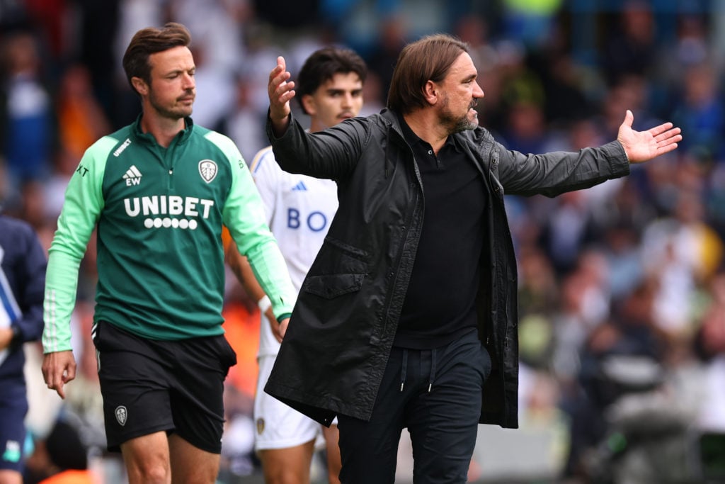 Leeds United manager Daniel Farke raises his arms during a Championship game against Cardiff City.
