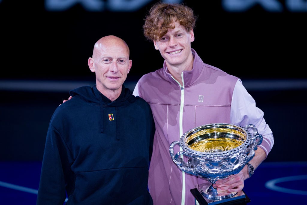 Umberto Ferrara and Jannik Sinner pose together after the 2024 Australian Open final