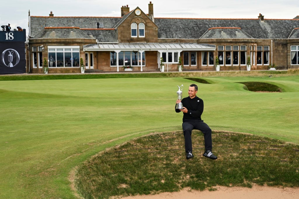 Xander Schauffele holds The Open Championship trophy at Royal Troon