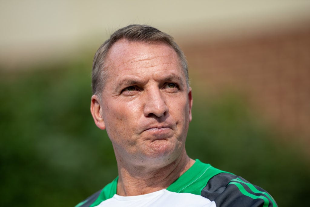 Brendan Rodgers of Celtic walks out of the tunnel before a match between Manchester City and Celtic at Kenan Stadium