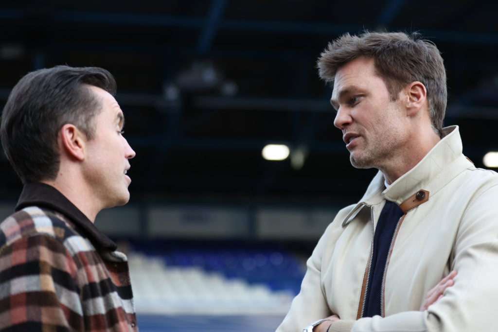 Rob McElhenney, co owner of Wrexham talks with Tom Brady