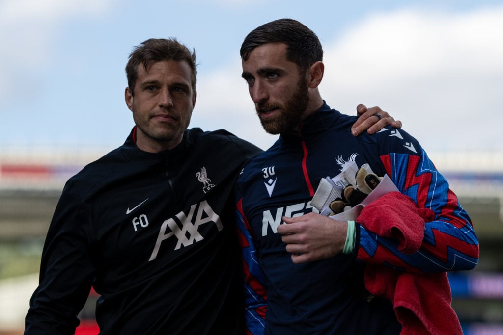 Liverpool goalkeeping coach Fabian Otte talks to Crystal Palace goalkeeper Matt Turner ahead of the Premier League match at Selhurst Park.