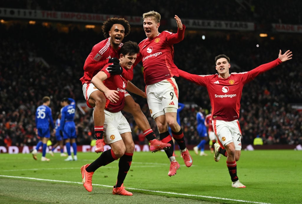 Harry Maguire of Manchester United celebrates scoring his team's second goal with team mates Joshua Zirkzee and Rasmus Hojlund