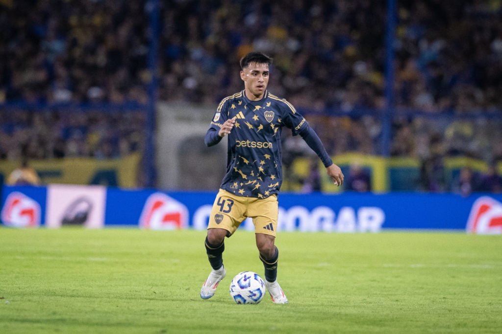 Milton Delgado of Boca Juniors controls the ball.