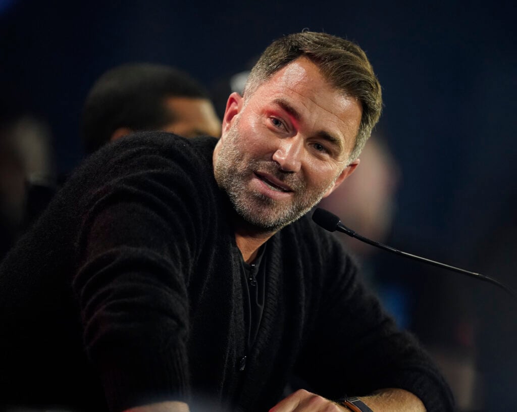 Eddie Hearn speaking into the mic at the Chris Eubank Jr. vs Conor Benn press conference