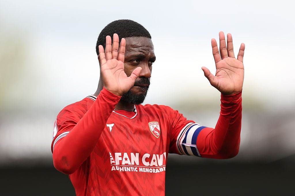 Morecambe captain Yann Songo'o apologising to his fans as their relegation from League Two was confirmed