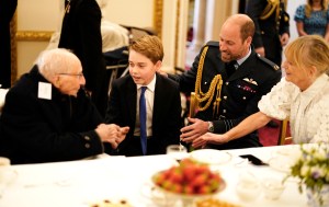 LONDON, ENGLAND - MAY 5: Prince William, Prince of Wales and Prince George join Second World War veterans at a tea party in Buckingham Palace following the military procession to mark the 80th anniversary of VE Day on May 5, 2025 in London, England. The King and Queen, joined by Members of the Royal Family, will take part in events from May 5th to May 8th to commemorate the 80th Anniversary of VE Day, which signalled the end of the Second World War in Europe. (Photo by Jordan Pettitt - WPA Pool/Getty Images)