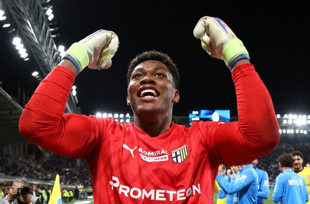 Parma goalkeeper Zion Suzuki celebrates after beating Atalanta in Serie A.