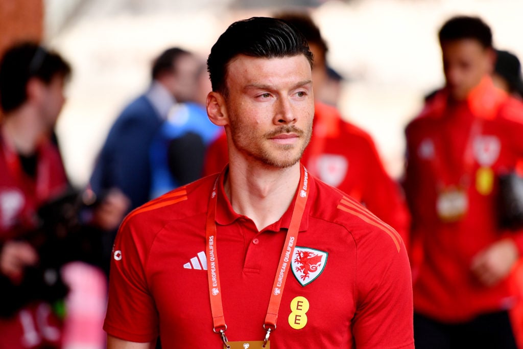 Kieffer Moore of Wales arrives