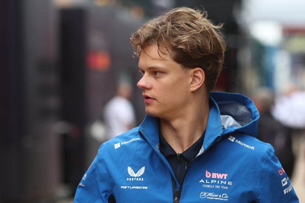 Alpine reserve driver Paul Aron in the 2025 F1 British Grand Prix paddock