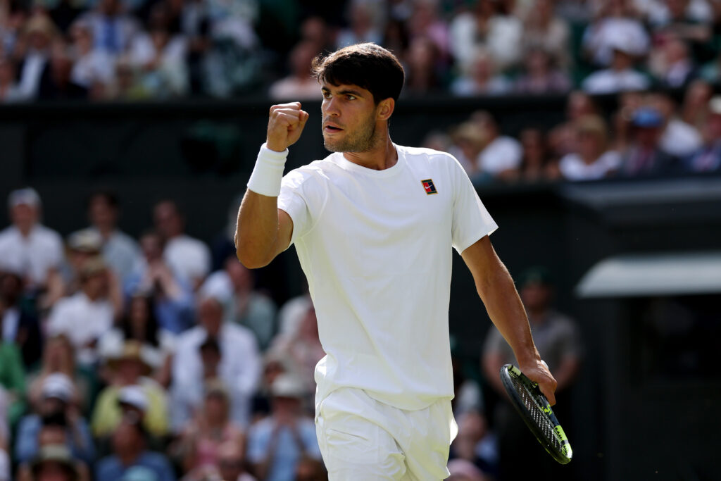 Carlos Alcaraz of Spain celebrates a point against Oliver Tarvet of Great Britain during the Gentleman's Singles Second Round match on day three of The Championships Wimbledon 2025 at All England Lawn Tennis and Croquet Club on July 02, 2025 in London, England.
