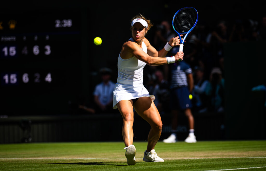 Laura Siegemund goes to hit a backhand at the Wimbledon Championships quarter-finals